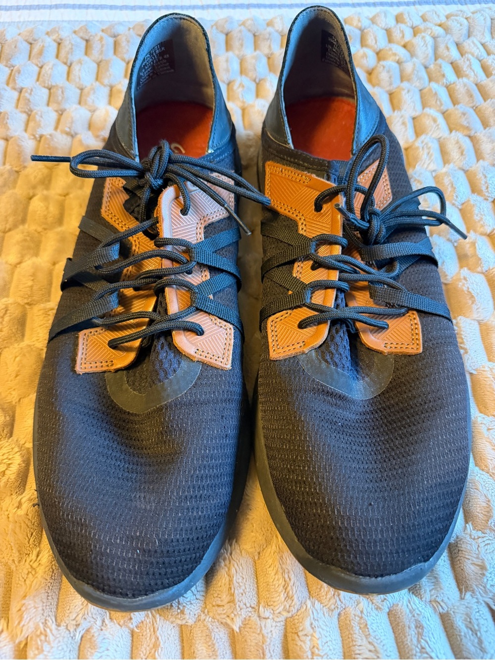 OluKai Men's Black Shoes with Tan Accents